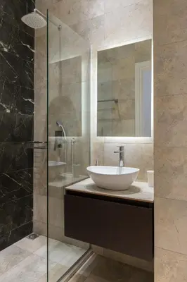 a bathroom with a sink and a glass shower at Voda Luxury Residence #301 - Acropolis View Rooftop in Athens