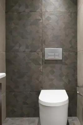 a bathroom with a toilet and a tiled wall at Voda Luxury Residence #401 - Acropolis View Rooftop in Athens