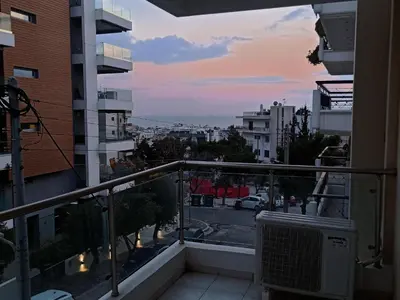 a balcony with a view of a city at Alimos seaview apartment in Athens