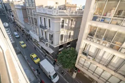 an overhead view of a city street with cars and buildings at Monastiraki metro station studio for 4 pers by MPS in Athens