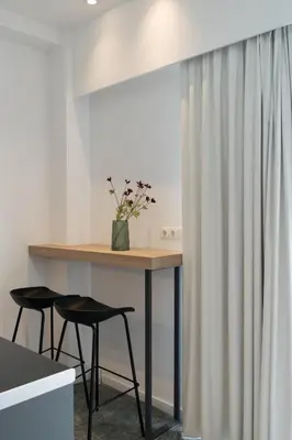 a desk with two chairs and a table with a curtain at Voda Luxury Residence Penthouse #601 - Acropolis View Rooftop in Athens