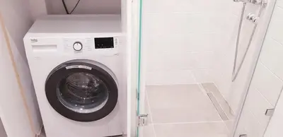 a washer and dryer in a small room at B2 Acropolis in Athens