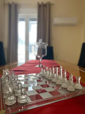 a chess board on top of a table at Elegant Apartment in Athens