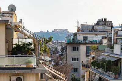 a view of a city with buildings at Loft Apt with Acropolis View in Athens