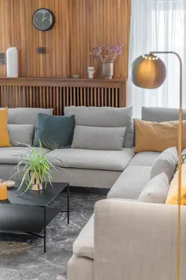 a living room with two couches and a table at Foothills of Acropolis-Thissio 3 bdrm apartment in Athens
