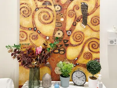 a wall mural with a clock and flowers on a table at near Acropolis new 2 bedrooms apt in Koukaki in Athens