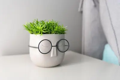 a potted plant with glasses sitting on a table at New-built apartment close to Athens city centre (Form_E1) in Athens