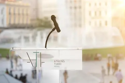 a microphone on a podium in front of a building at Athens Tiare by Mage Hotels in Athens