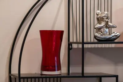 a red vase sitting on a shelf next to a lamp at Athens Exarcheia Vibe 2 in Athens