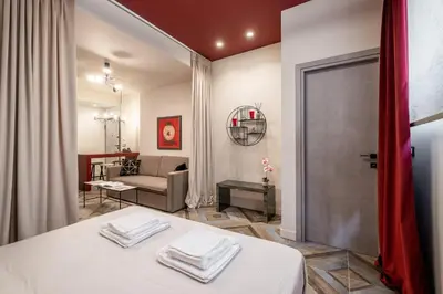 a room with a table with towels on it at Athens Exarcheia Vibe 2 in Athens