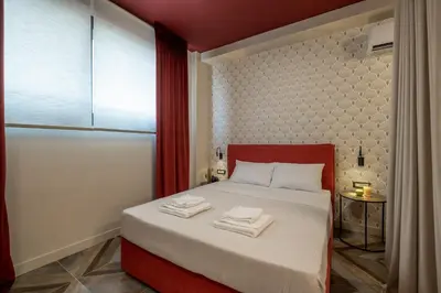 a bedroom with a bed with towels on it at Athens Exarcheia Vibe 2 in Athens