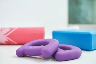 a pair of purple handles on a table next to a box at Urban Heights 3BD Apt, next to Hilton in Athens