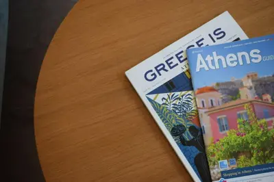a book sitting on top of a table at Acropolis View Apartment Athens Downtown in Athens