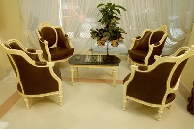 a group of chairs and a table in a room at Hotel Solomou Athens in Athens