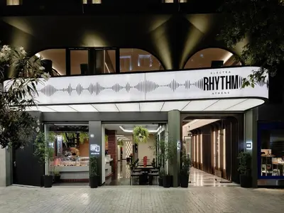 a shopping mall with a sign that reads ripulum at Electra Rhythm Athens in Athens