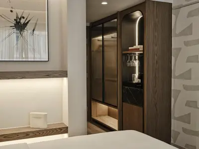 a bedroom with a closet with a glass door at Electra Rhythm Athens in Athens