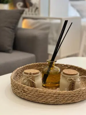 a tray of honey and candles on a table at Stay Calm in Athens