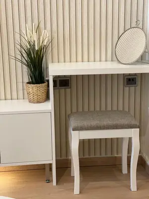 a white desk with a stool and a table with a chair at Stay Calm in Athens