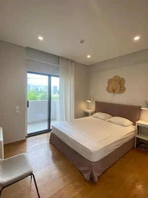 a bedroom with a large bed and a large window at Athens Riviera 2-Bed Apt & Pool Access #Unoblu® in Athens