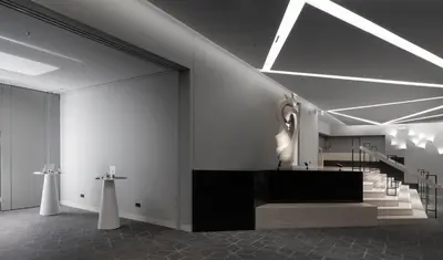 a room with a staircase and a cross on the wall at Crowne Plaza Athens City Centre by IHG in Athens