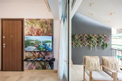 a room with a door and a painting on the wall at Blue Ark Boho Stay at Acropolis in Athens