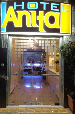 a store front of a car shop with a sign at Anita Hotel in Piraeus