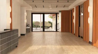an empty hallway with doors to a patio at Ace Hotel & Swim Club Athens in Athens
