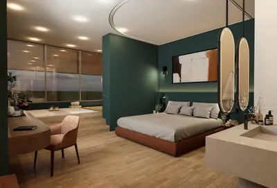 a bedroom with a large bed and a bathroom at The Stanley in Athens