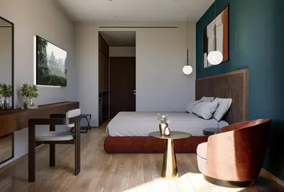 a bedroom with a bed and a table and chairs at The Stanley in Athens