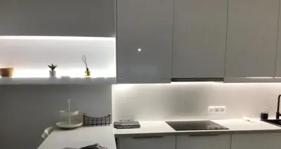 a kitchen with white cabinets and a counter top at ATHENS RIVIERA Grand Panoramic Villa II Lagonissi in Lagonissi