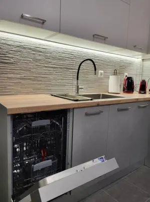 a kitchen with a sink and a dishwasher at Plaka Sofi Suite in Athens