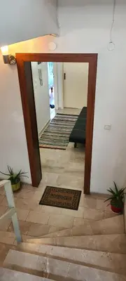 a hallway with a door leading into a room at A peaceful apartment in Athens in Athens