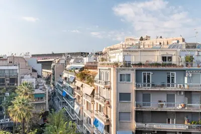 an overhead view of buildings in a city at HighEnd 5BDR NewApt w/Breathtaking Acropolis View in Athens