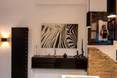 a painting of a zebra is on a wall at Avant-Garde Studio in Athens