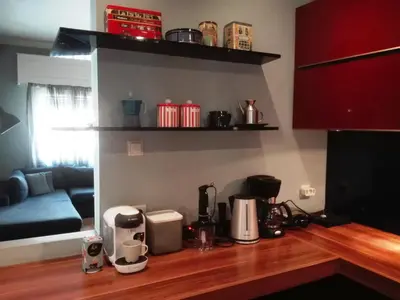 a kitchen with a counter top with appliances on it at Exarchia Square central Athens 110m2 apartment in Athens