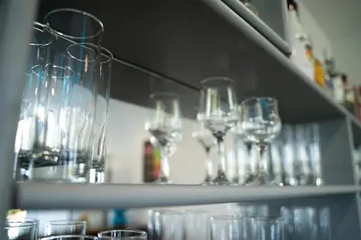 a shelf with wine glasses on it at Parthenis Riviera Hotel in Athens
