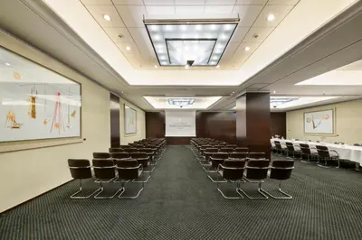 a conference room with chairs and a table at Athenaeum Intercontinental by IHG in Athens