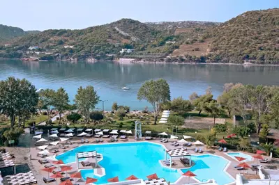 an aerial view of a resort with a lake at Zeus Dolce by Wyndham Athens in Vravrona