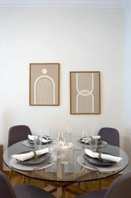 a dining room with a glass table and chairs at Warm & Coozy Residence in Athens