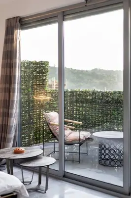 a room with a balcony with a large window at The Parthenon View in the Historical Center! in Athens