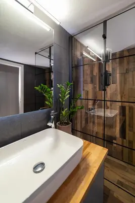 a bathroom with a white sink and a shower at Apartment_41 in Athens