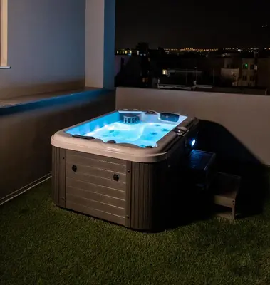 a hot tub in the corner of a room at Majestic Penthouse Acropolis in Athens