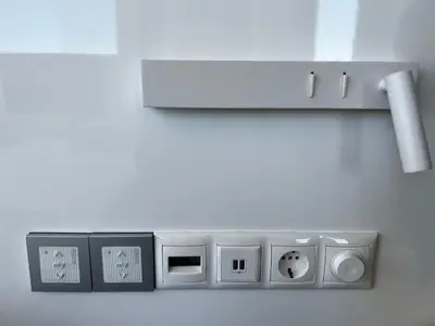 an empty room with a control panel and a wall at Majestic Penthouse Acropolis in Athens