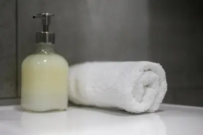 a roll of toilet paper next to a bottle of soap at Athena’s Hideaway- Fully Renovated- Absolute Best Location in Athens