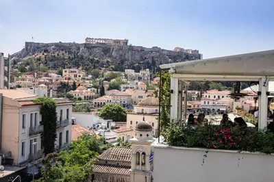 a view of a city with a mountain in the background at Acropolis Breathtaking View in Athens
