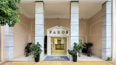 a front door of a store with a sign that reads francos at Faros II in Piraeus