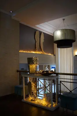 a room with a table with lights on it at Minoa Athens Hotel in Athens