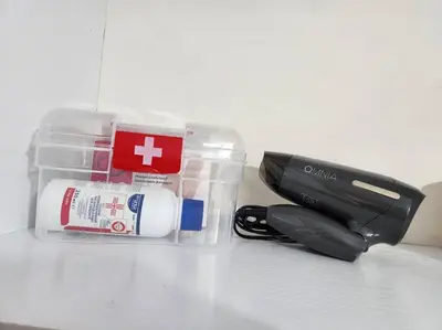 a black pen and a plastic container on a table at Comfy Place In Panteleymon VIPGreece in Athens
