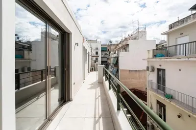 an apartment balcony with a view of a street at Elysee apatment 9A in Athens