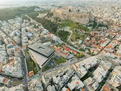 an aerial view of a city with buildings at Modern Loft Build on Acropolis Ruins in Athens